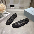 PRADA 26S LOGO PLAQUE MARY JANE FLATS IN BLACK WOVEN FIBER