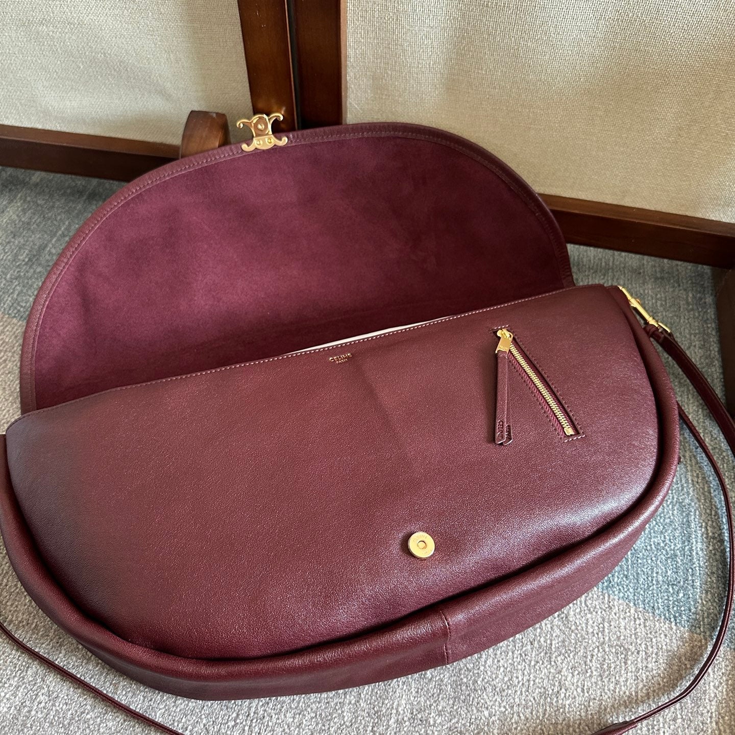 CELINE 25S HALFMOON SOFT TRIOMPHE BAG 46MM IN SYRAH RED SUPPLE SHINY LAMBSKIN