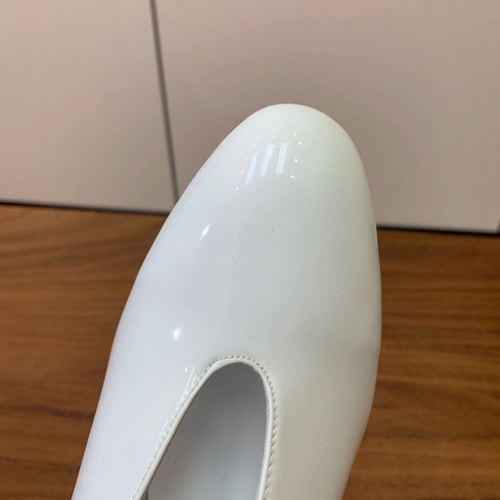 ALAIA 26S WEDGE MULES 70 MM IN WHITE GLOSSY CALFSKIN
