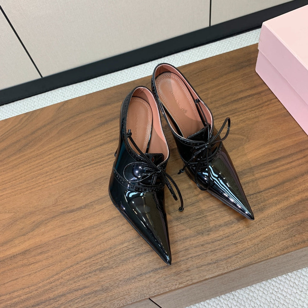 ALAIA 26S LACE-UP HEELED 105 MM IN BLACK GLOSSY CALFSKIN