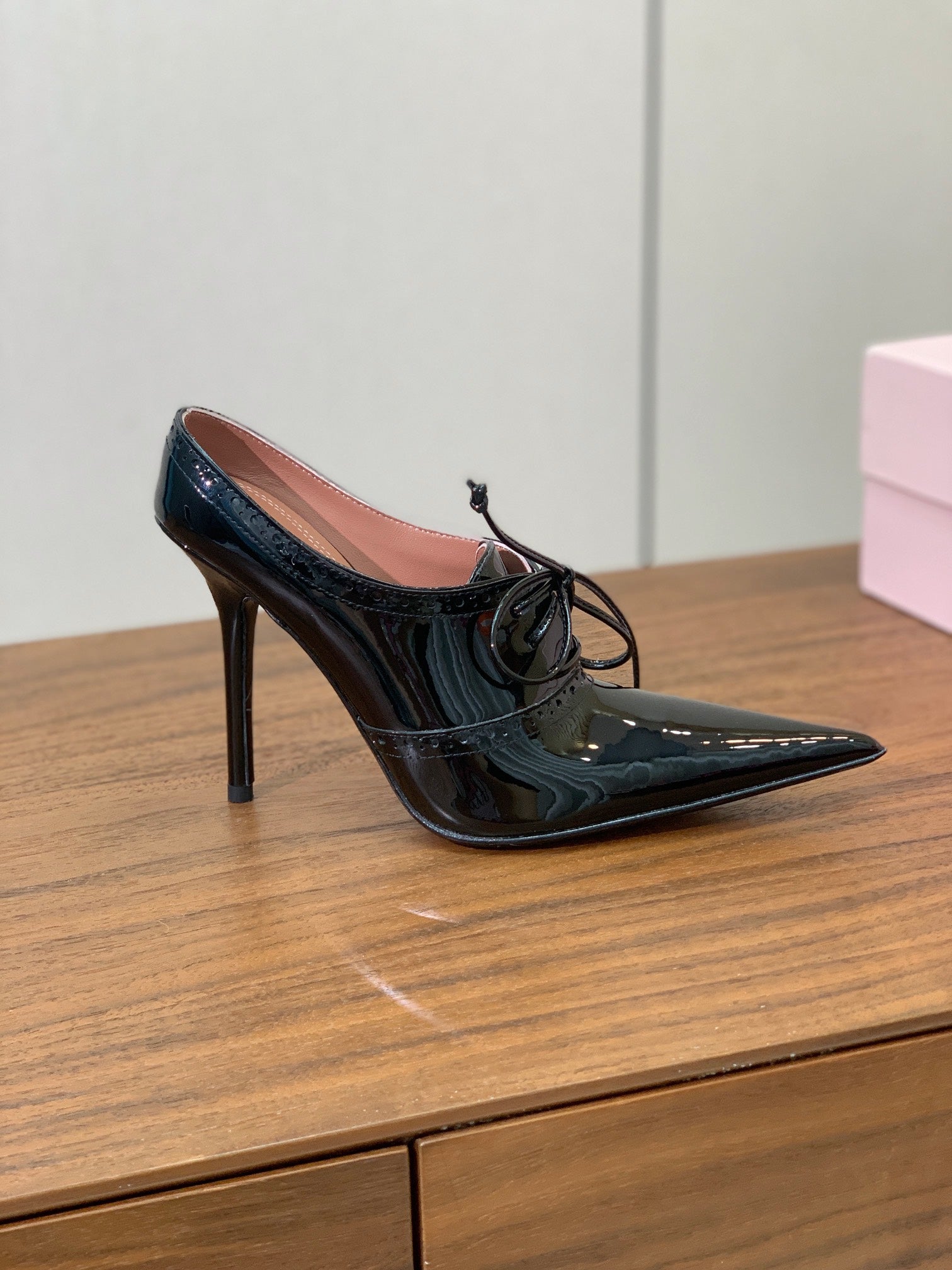 ALAIA 26S LACE-UP HEELED 105 MM IN BLACK GLOSSY CALFSKIN