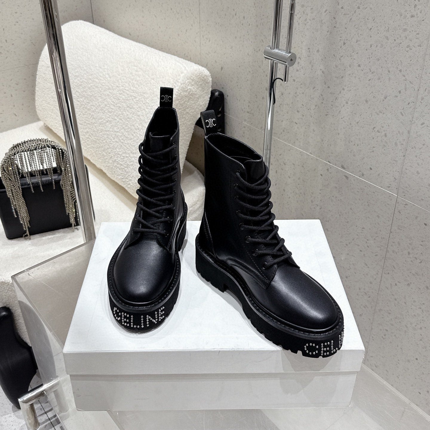CELINE 26S CHUNKY-SOLE COMBAT BOOTS IN BLACK CALFSKIN