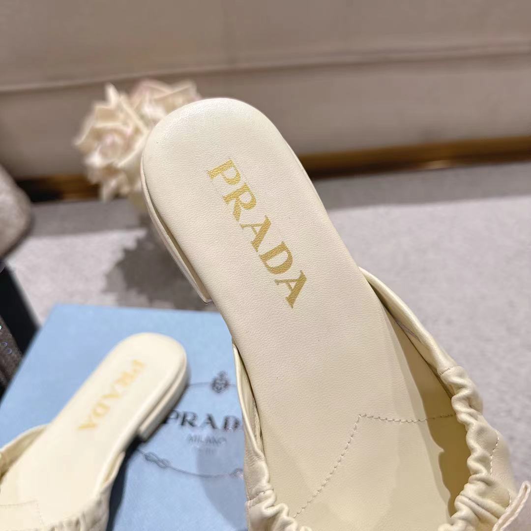 PRADA 26S RUCHED BOW SLIDE SANDALS IN IVORY WHITE CALFSKIN
