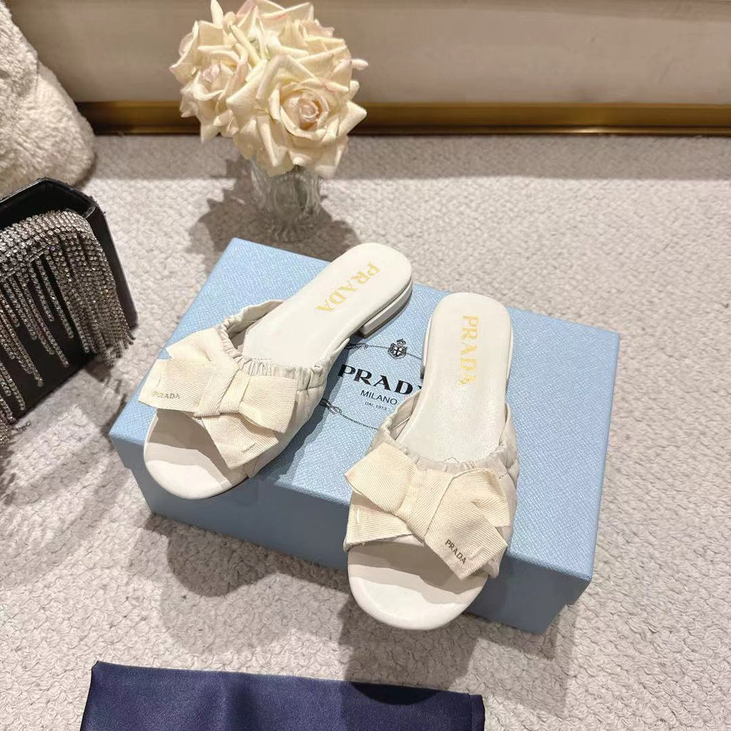 PRADA 26S RUCHED BOW SLIDE SANDALS IN CREAM WHITE CALFSKIN