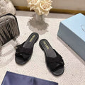 PRADA 26S RUCHED BOW SLIDE SANDALS IN BLACK CALFSKIN