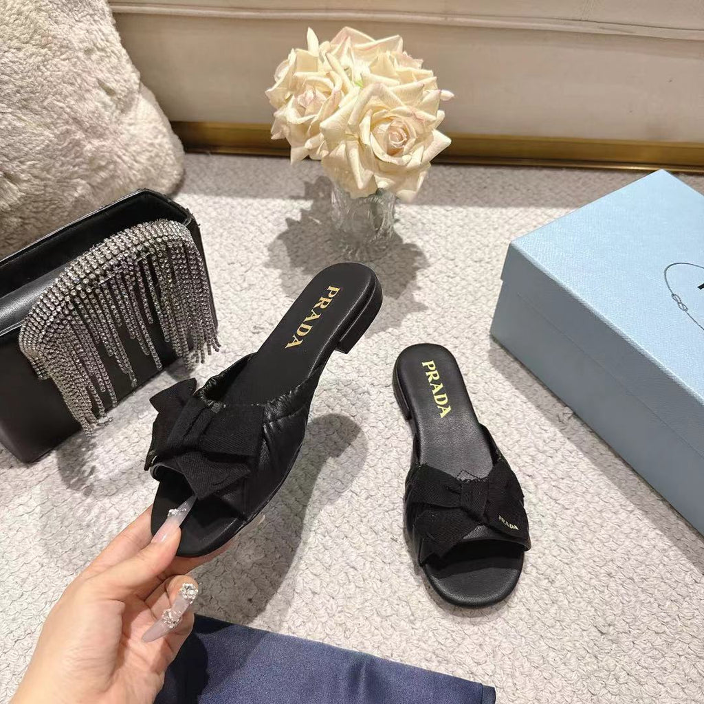 PRADA 26S RUCHED BOW SLIDE SANDALS IN BLACK CALFSKIN