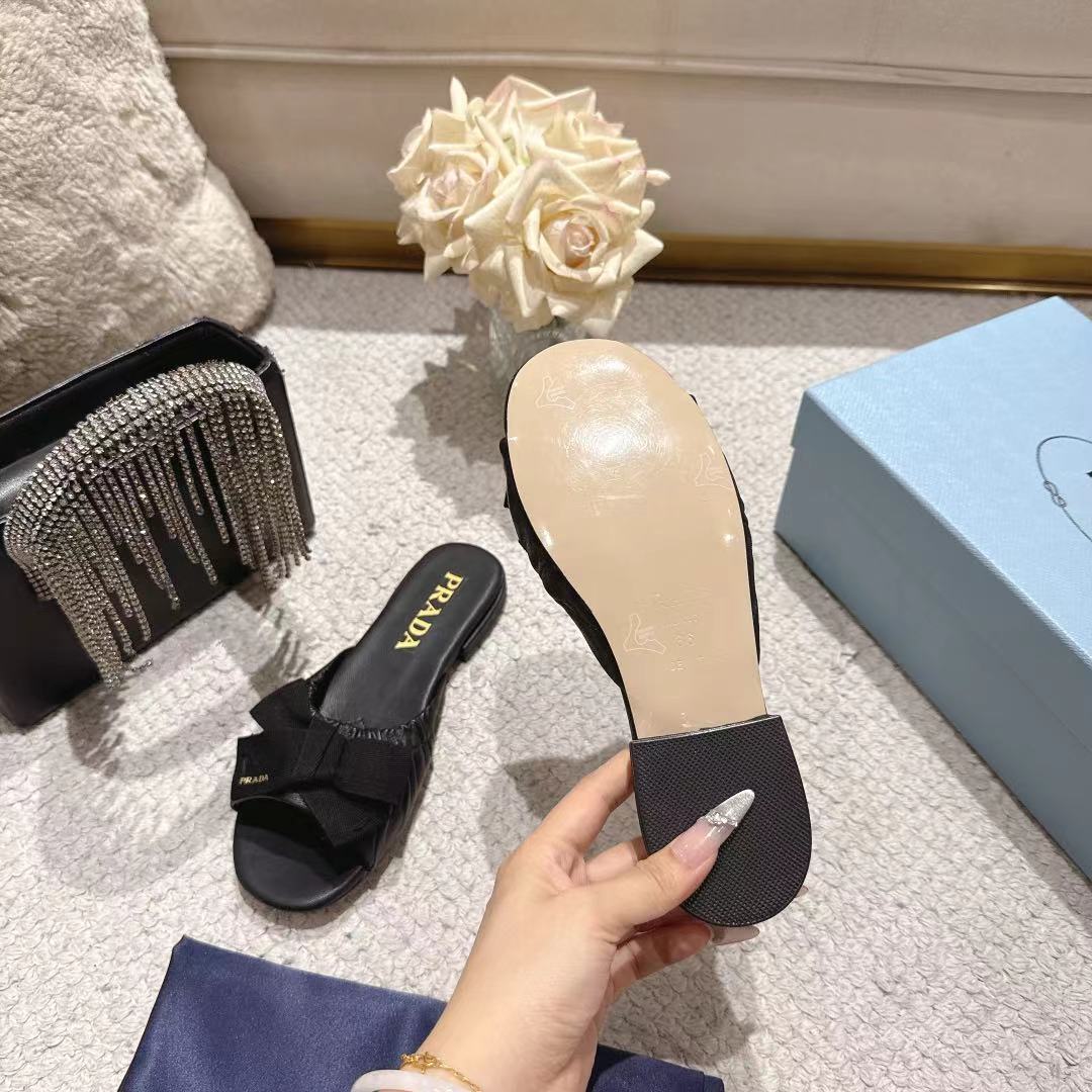 PRADA 26S RUCHED BOW SLIDE SANDALS IN BLACK CALFSKIN