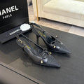 HIGH HEEL SLINGBACKS 65 MM IN BLACK WITH SNAKESKIN PATTERN LAMBSKIN
