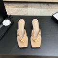 CHANEL 26S CAMELLIA THONG MULE IN BEIGE LAMBSKIN