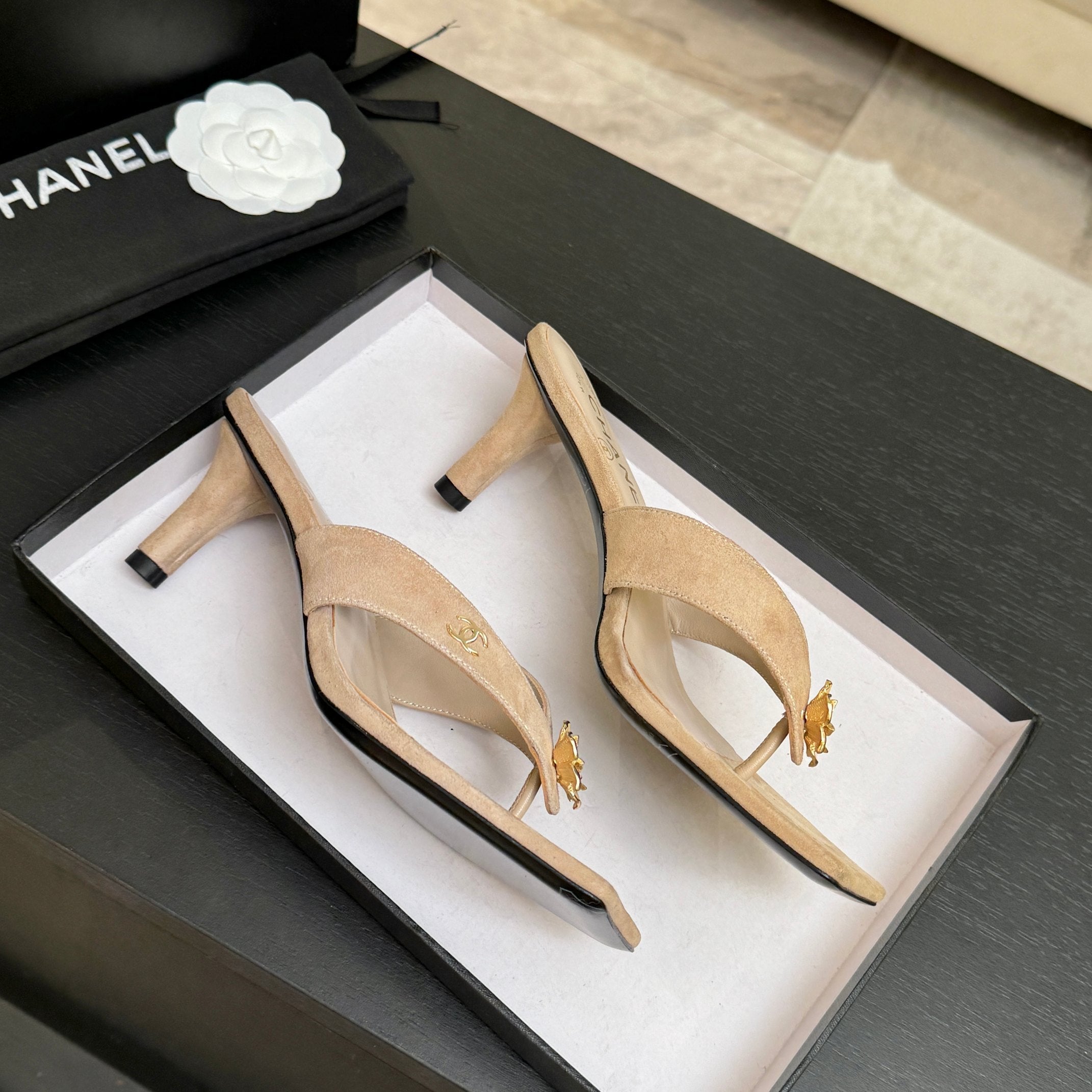 CHANEL 26S CAMELLIA THONG MULE IN BEIGE LAMBSKIN