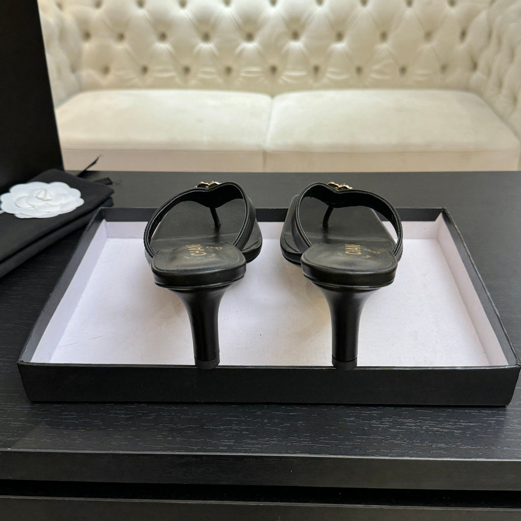 CHANEL 26S CAMELLIA THONG MULE IN BLACK LAMBSKIN