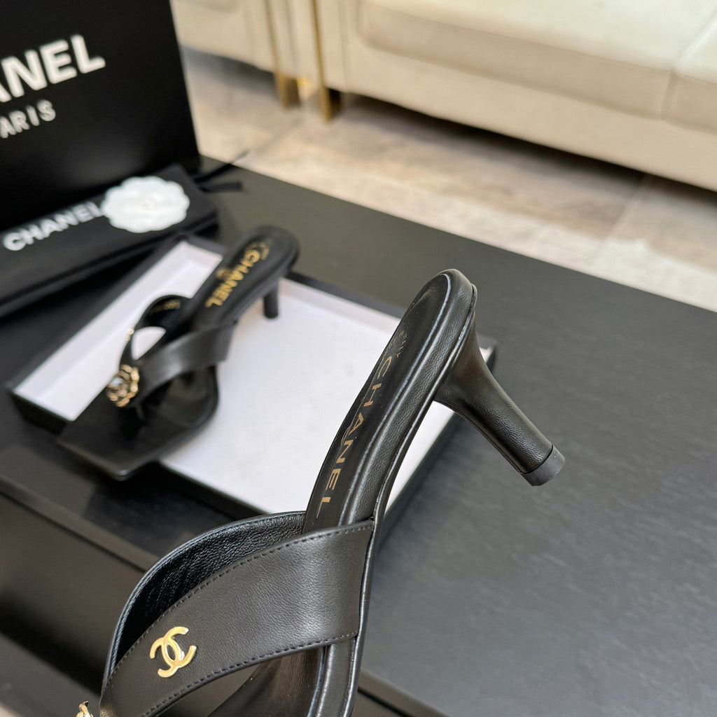 CHANEL 26S CAMELLIA THONG MULE IN BLACK LAMBSKIN
