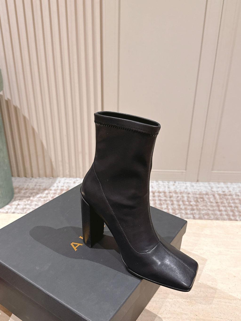 ALAIA 26S HEELED BOOTS 90 MM IN BLACK CALFSKIN