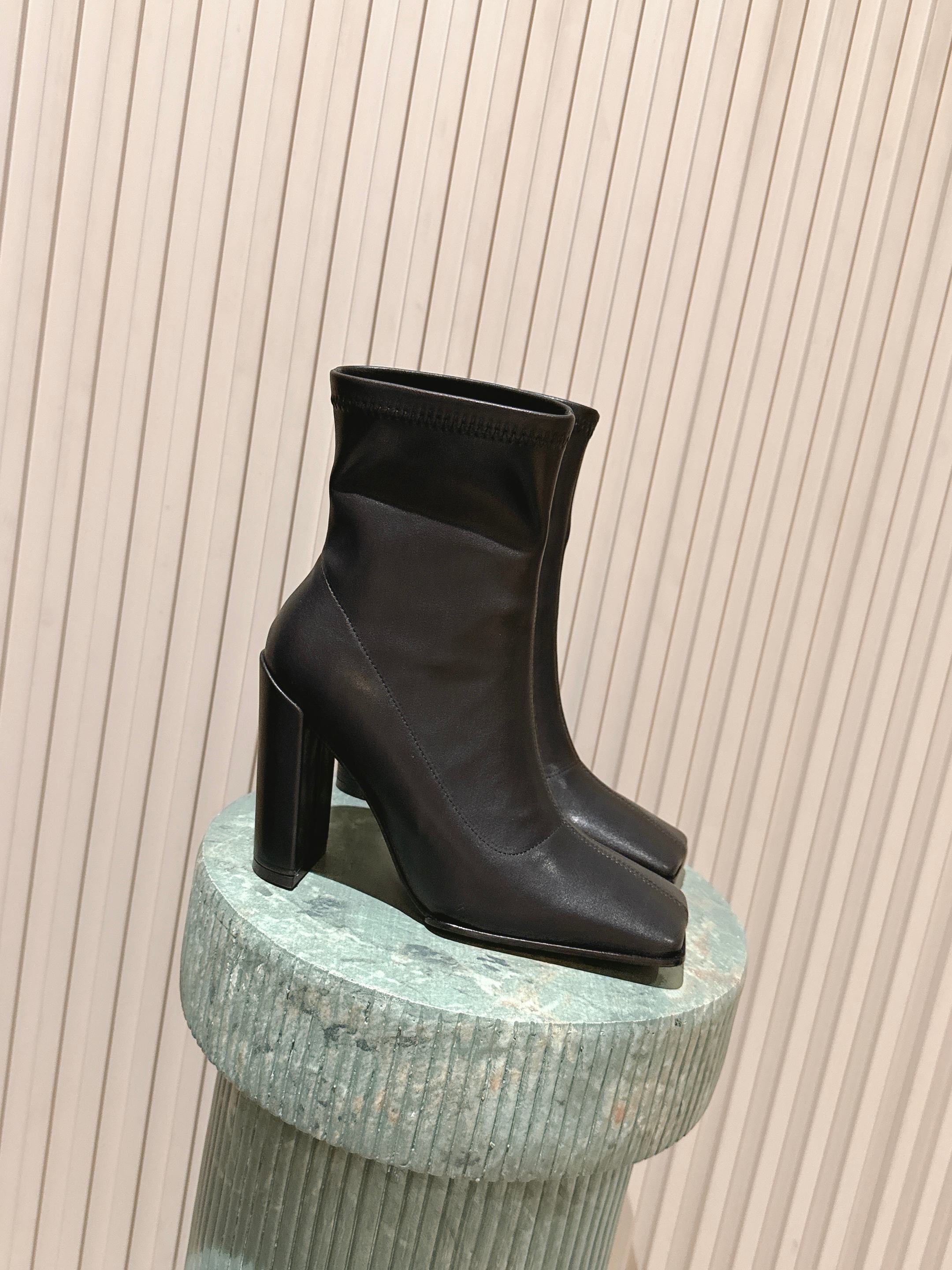 ALAIA 26S HEELED BOOTS 90 MM IN BLACK CALFSKIN