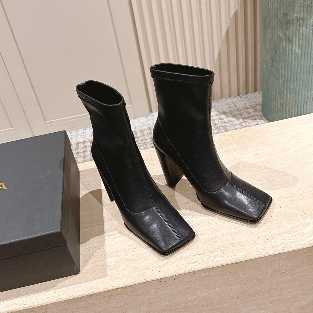 ALAIA 26S HEELED BOOTS 90 MM IN BLACK CALFSKIN