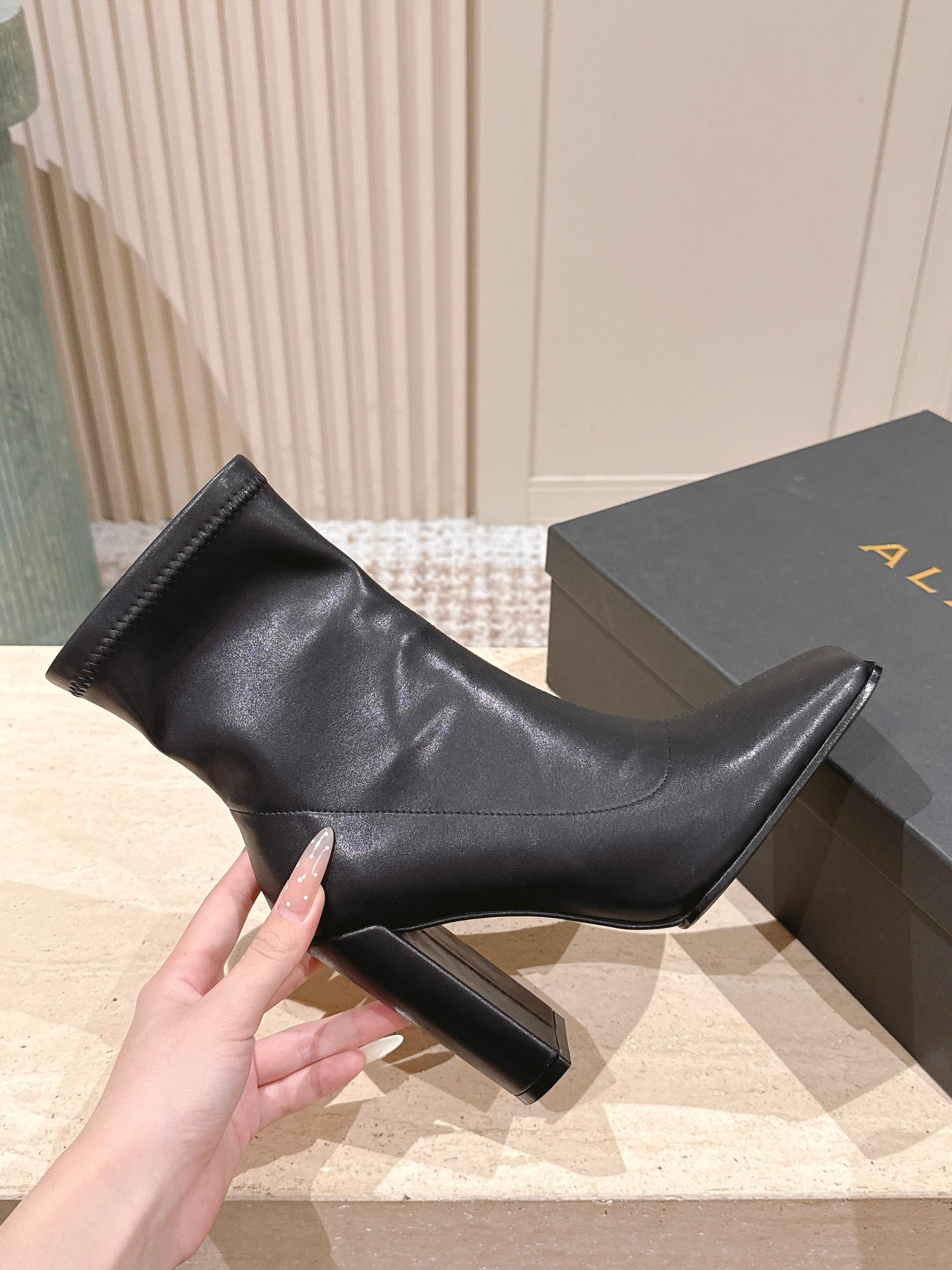 ALAIA 26S HEELED BOOTS 90 MM IN BLACK CALFSKIN