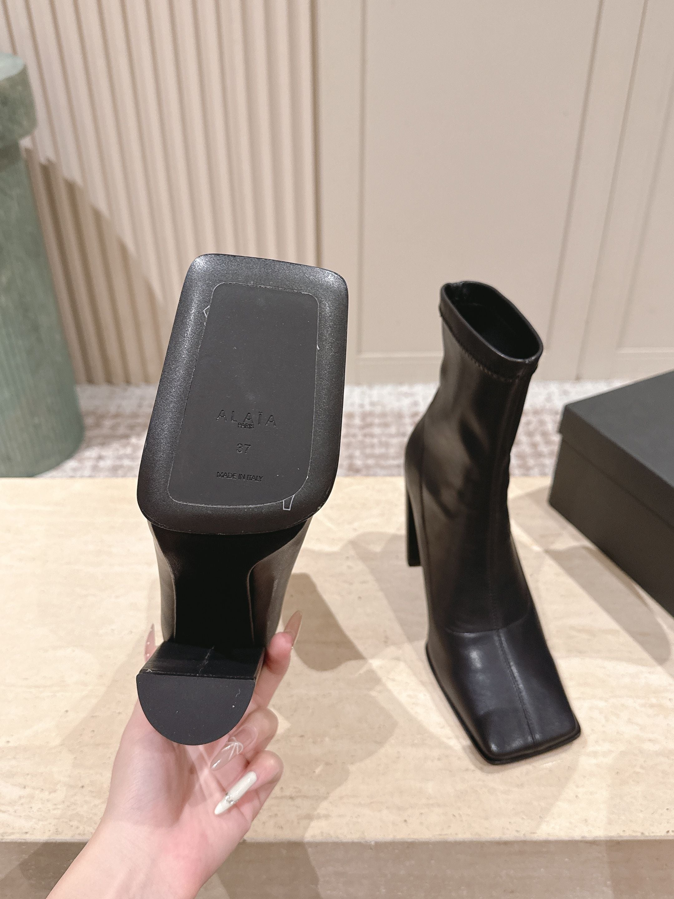ALAIA 26S HEELED BOOTS 90 MM IN BLACK CALFSKIN
