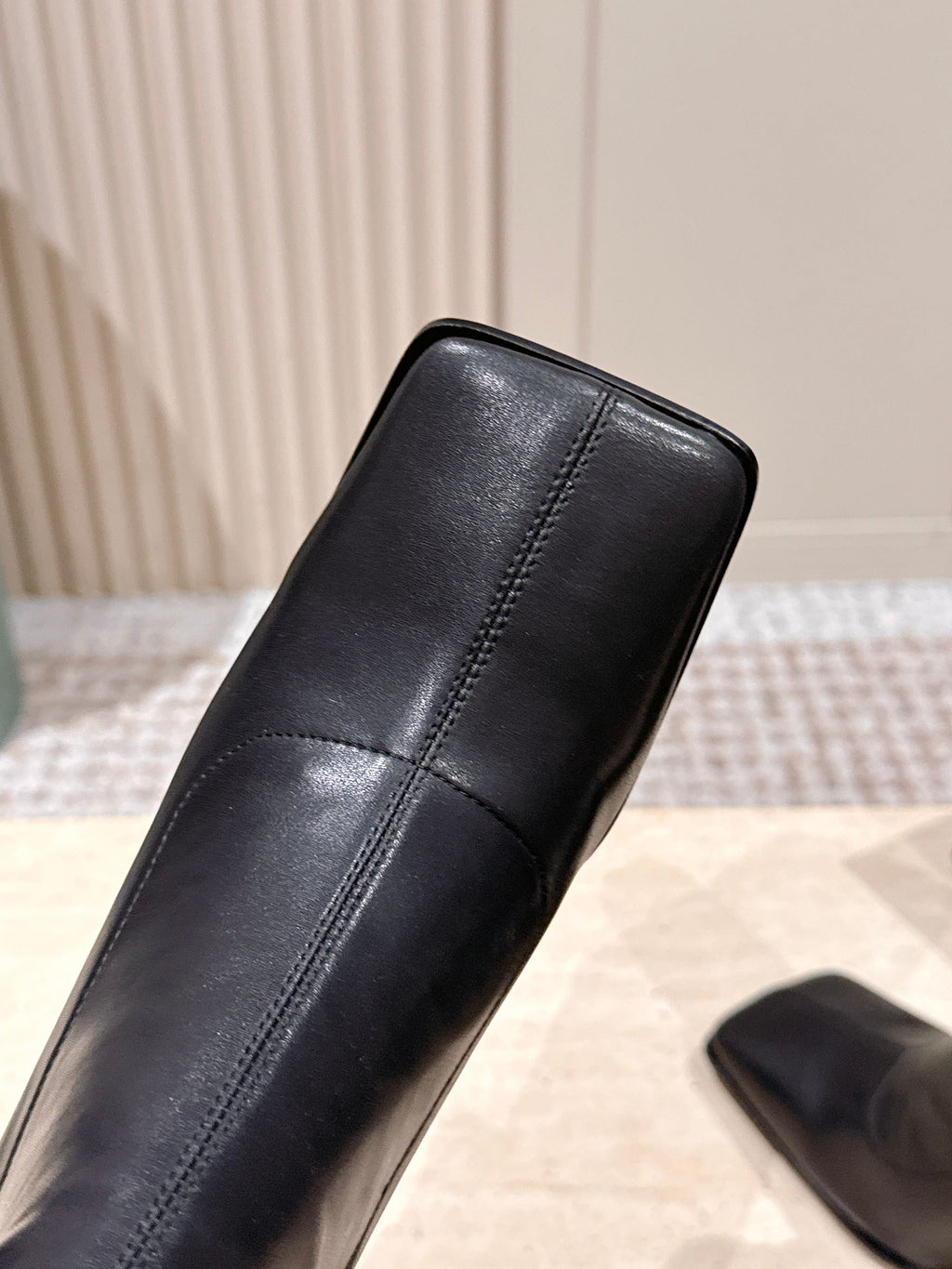 ALAIA 26S HEELED BOOTS 90 MM IN BLACK CALFSKIN