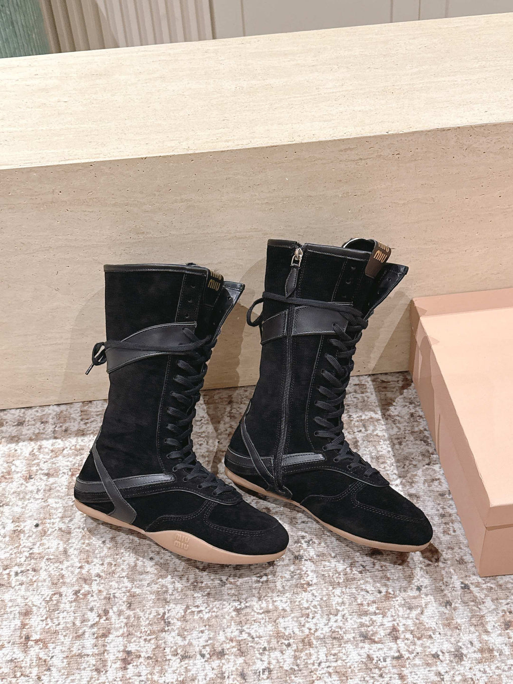 MIUMIU 25S ANKLE BOOTS IN BLACK SUEDE WITH SHEARLING