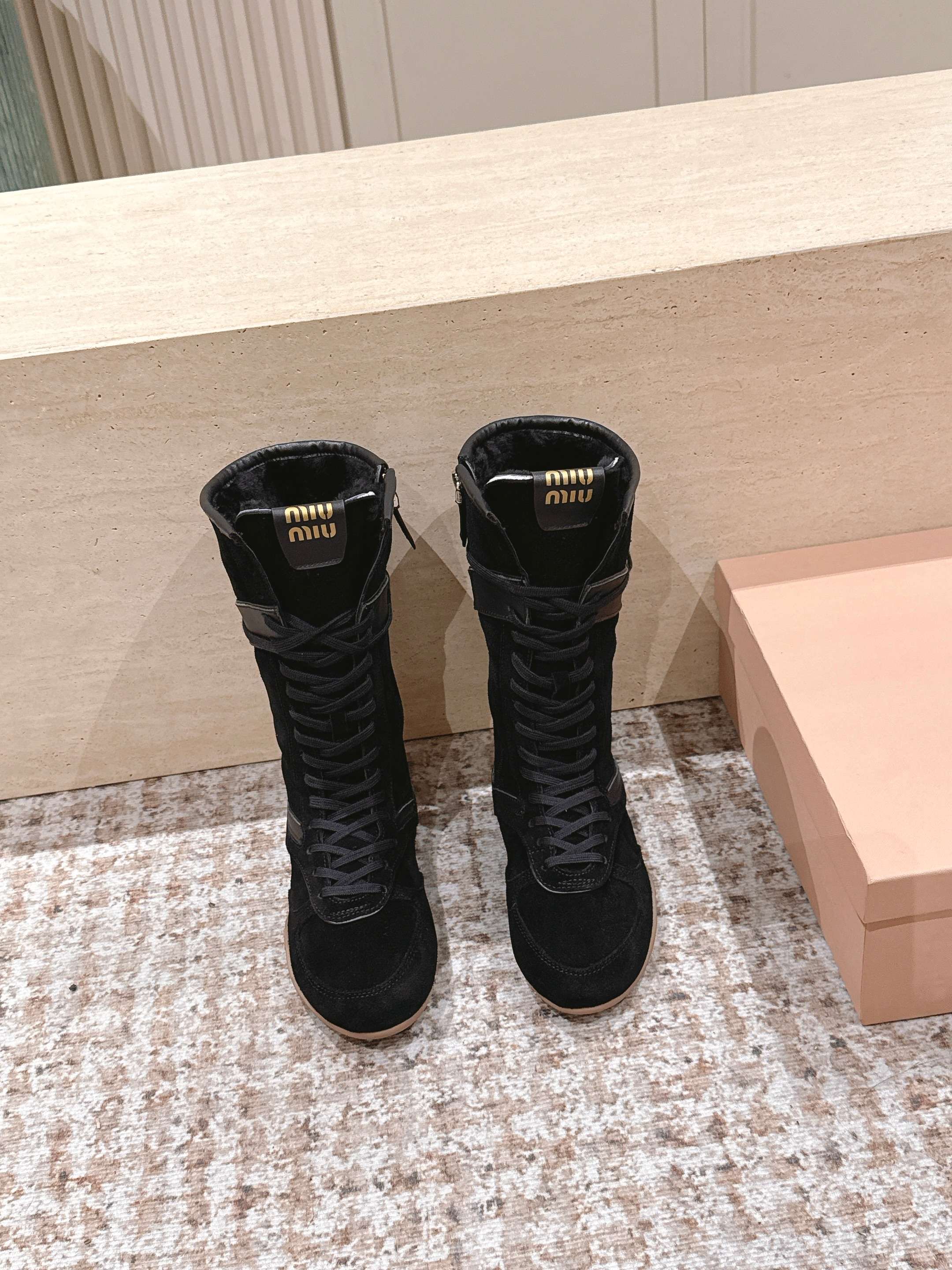 MIUMIU 25S ANKLE BOOTS IN BLACK SUEDE WITH SHEARLING