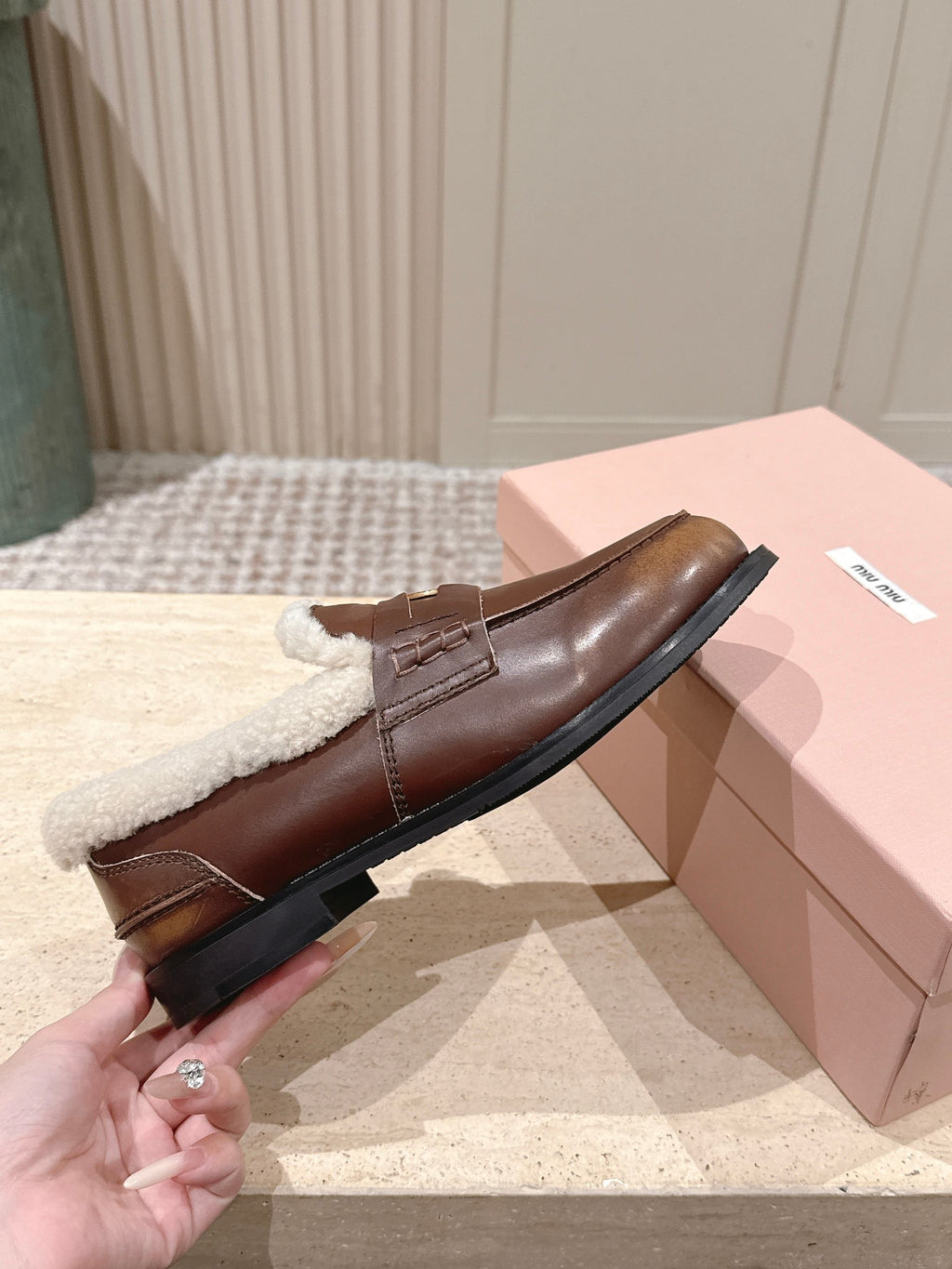 MIUMIU 25S PENNY LOAFERS 20MM IN EBONY BROWN BLEACHED CALFSKIN WITH SHEARLING