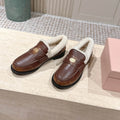 MIUMIU 25S PENNY LOAFERS 20MM IN EBONY BROWN BLEACHED CALFSKIN WITH SHEARLING