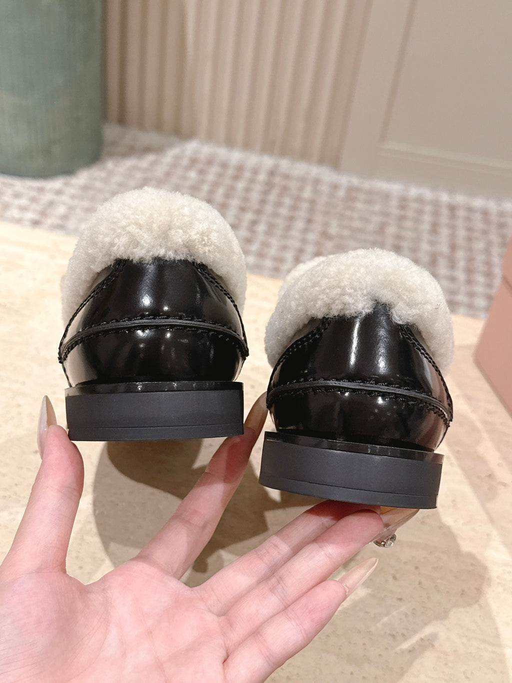 MIUMIU 25S PENNY LOAFERS 20MM IN BLACK PATENT CALFSKIN WITH SHEARLING