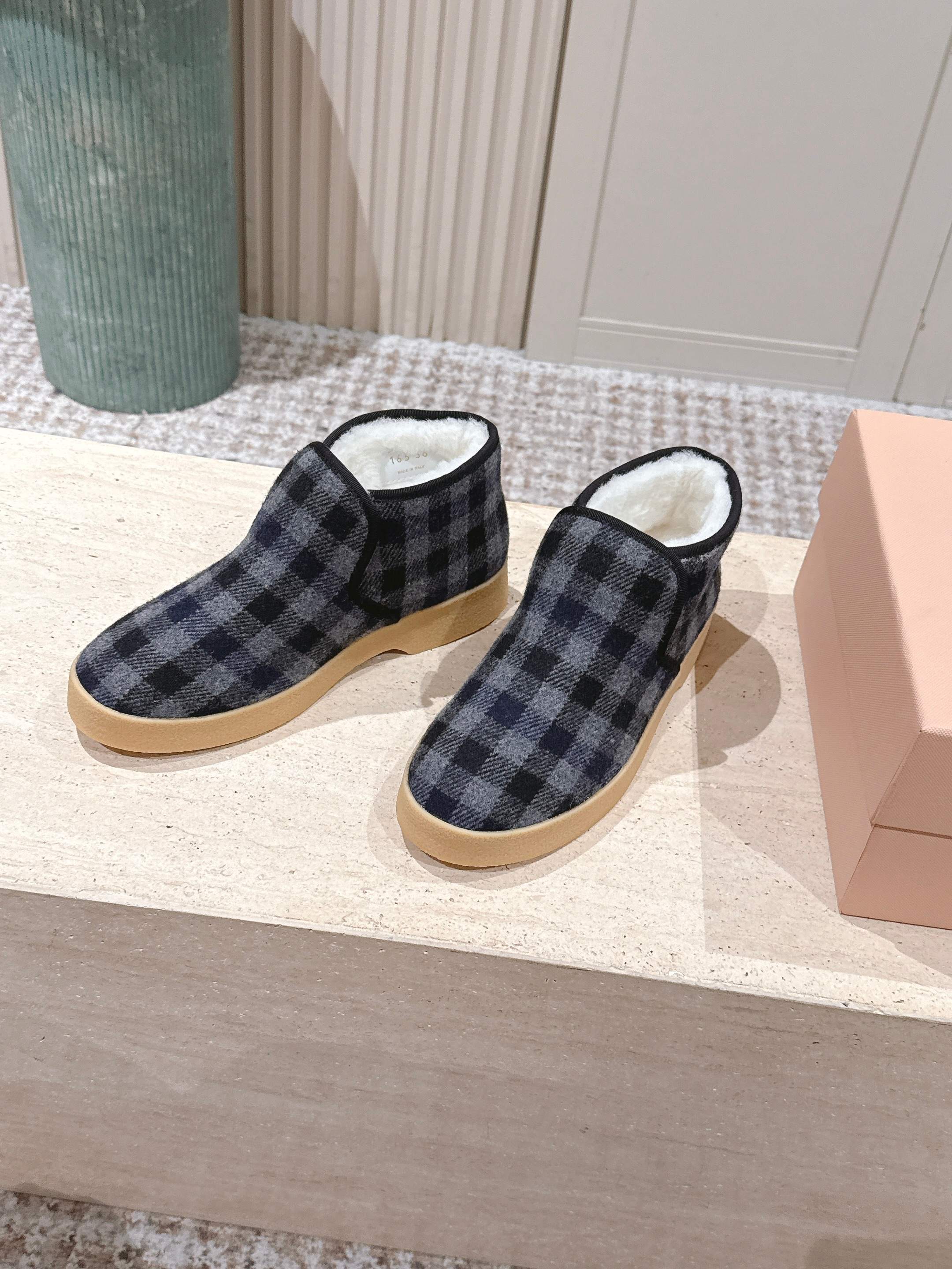 MIUMIU 25S SLIP-ON BOOTIES IN BLACK AND BLUE WOOL WITH SHEARLING
