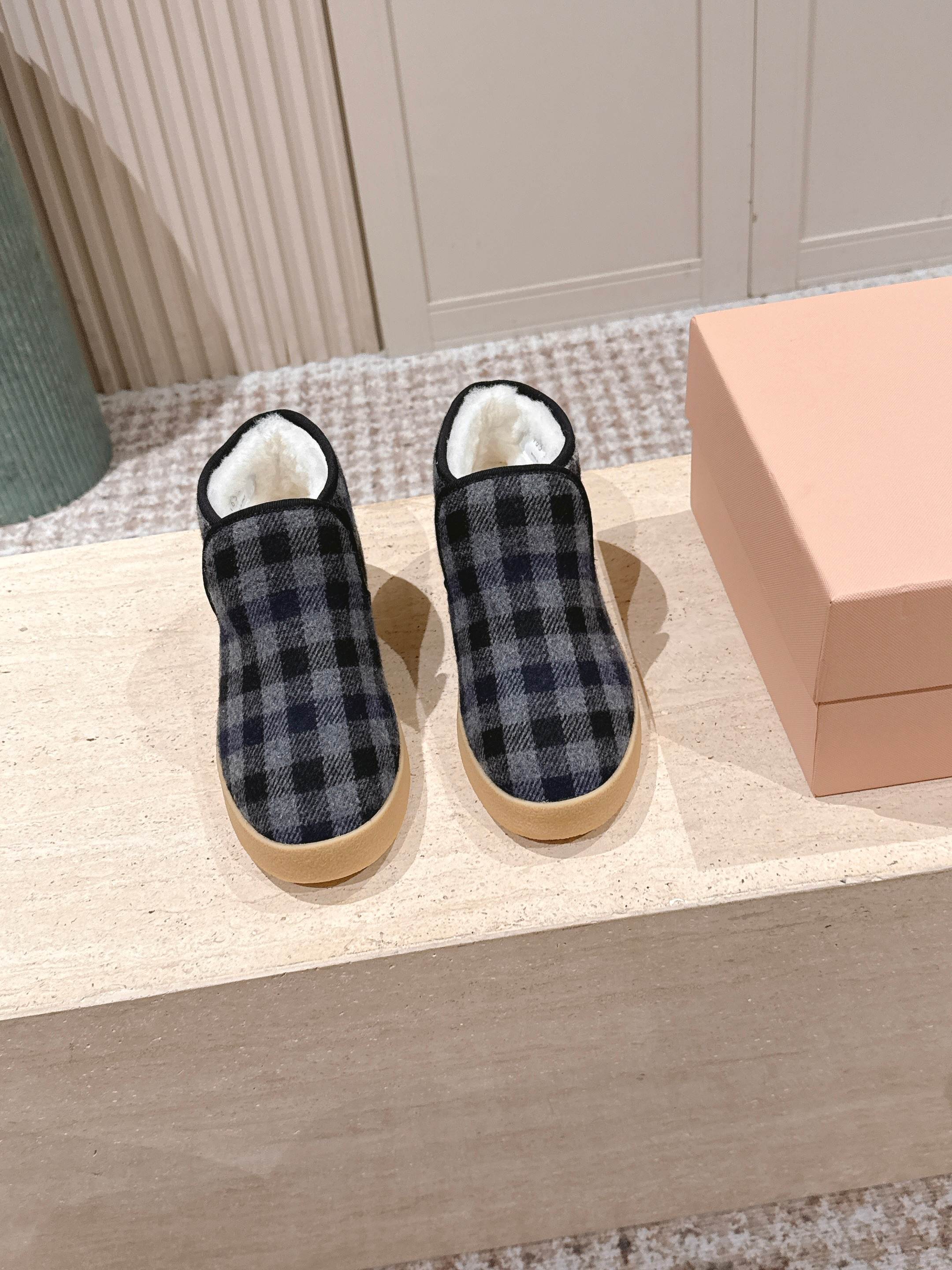 MIUMIU 25S SLIP-ON BOOTIES IN BLACK AND BLUE WOOL WITH SHEARLING