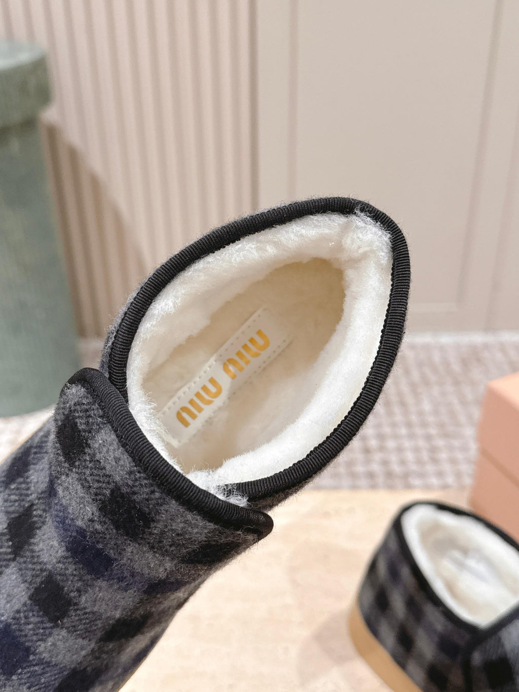 MIUMIU 25S SLIP-ON BOOTIES IN BLACK AND BLUE WOOL WITH SHEARLING