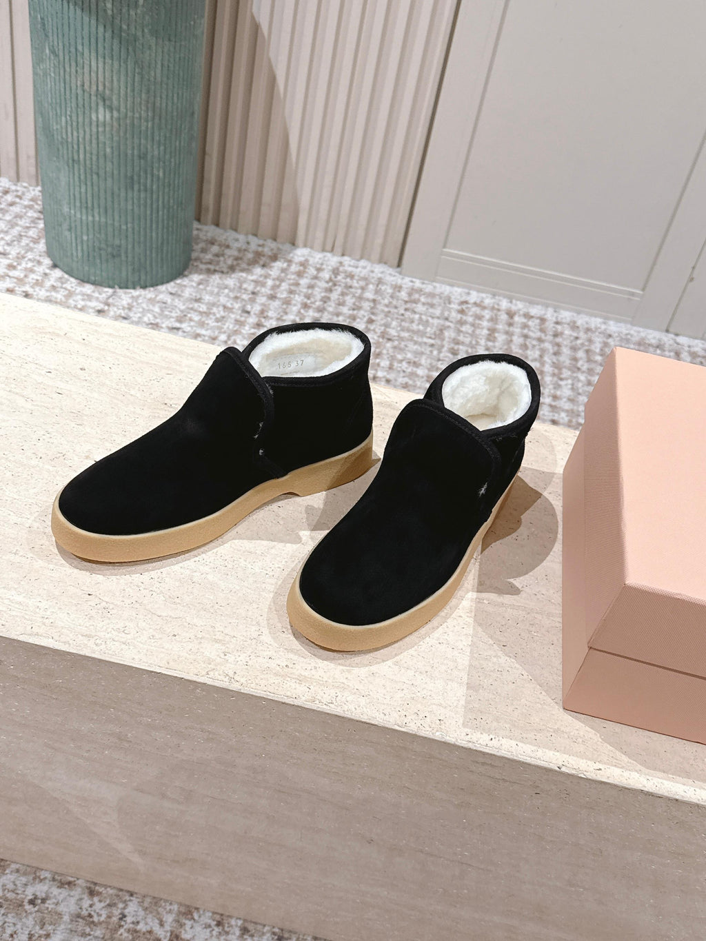MIUMIU 25S SLIP-ON BOOTIES IN BLACK SUEDE WITH FAUX SHEARLING