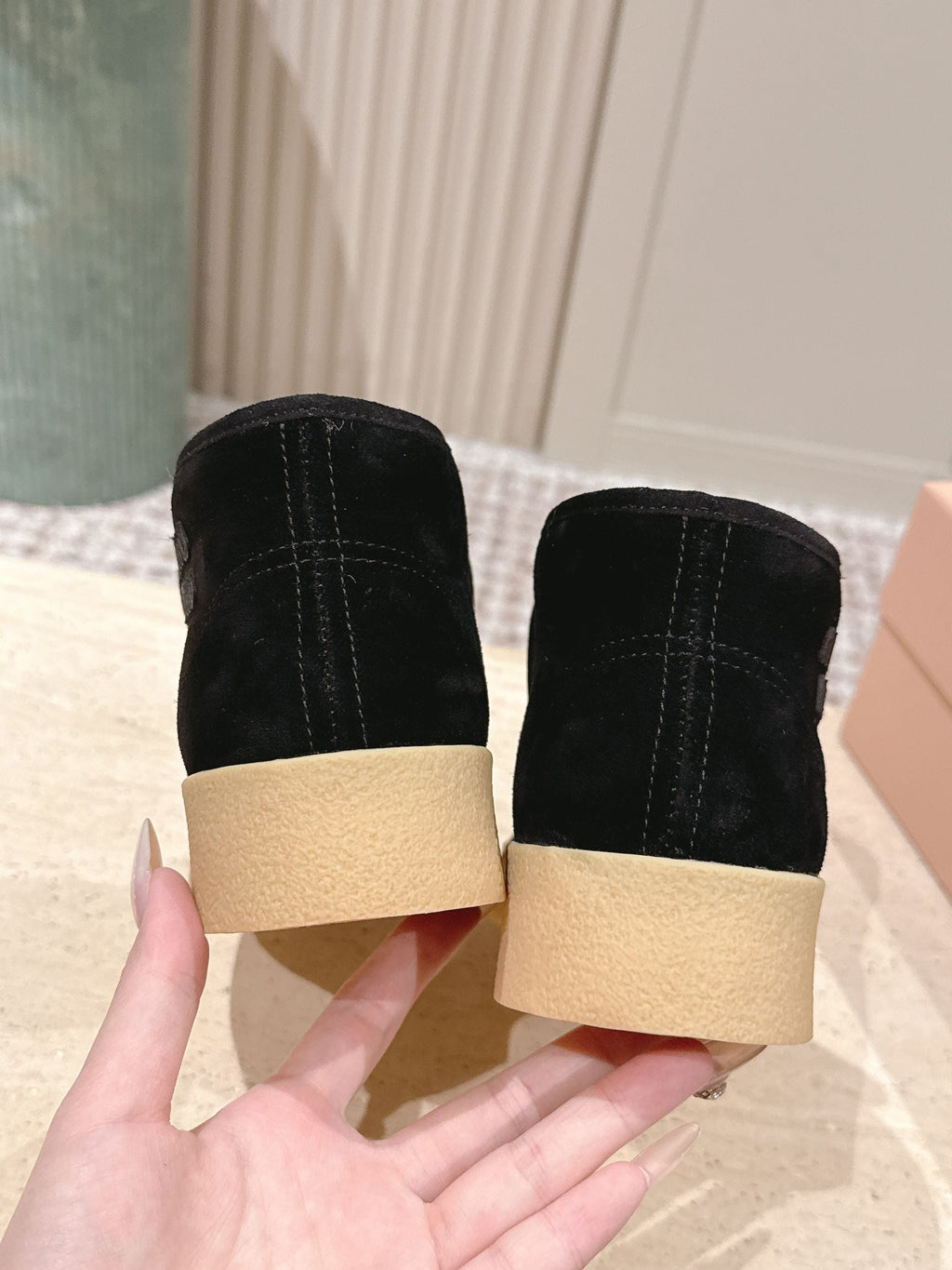 MIUMIU 25S SLIP-ON BOOTIES IN BLACK SUEDE WITH FAUX SHEARLING