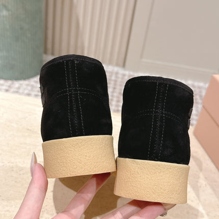 MIUMIU 25S SLIP-ON BOOTIES IN BLACK SUEDE WITH FAUX SHEARLING