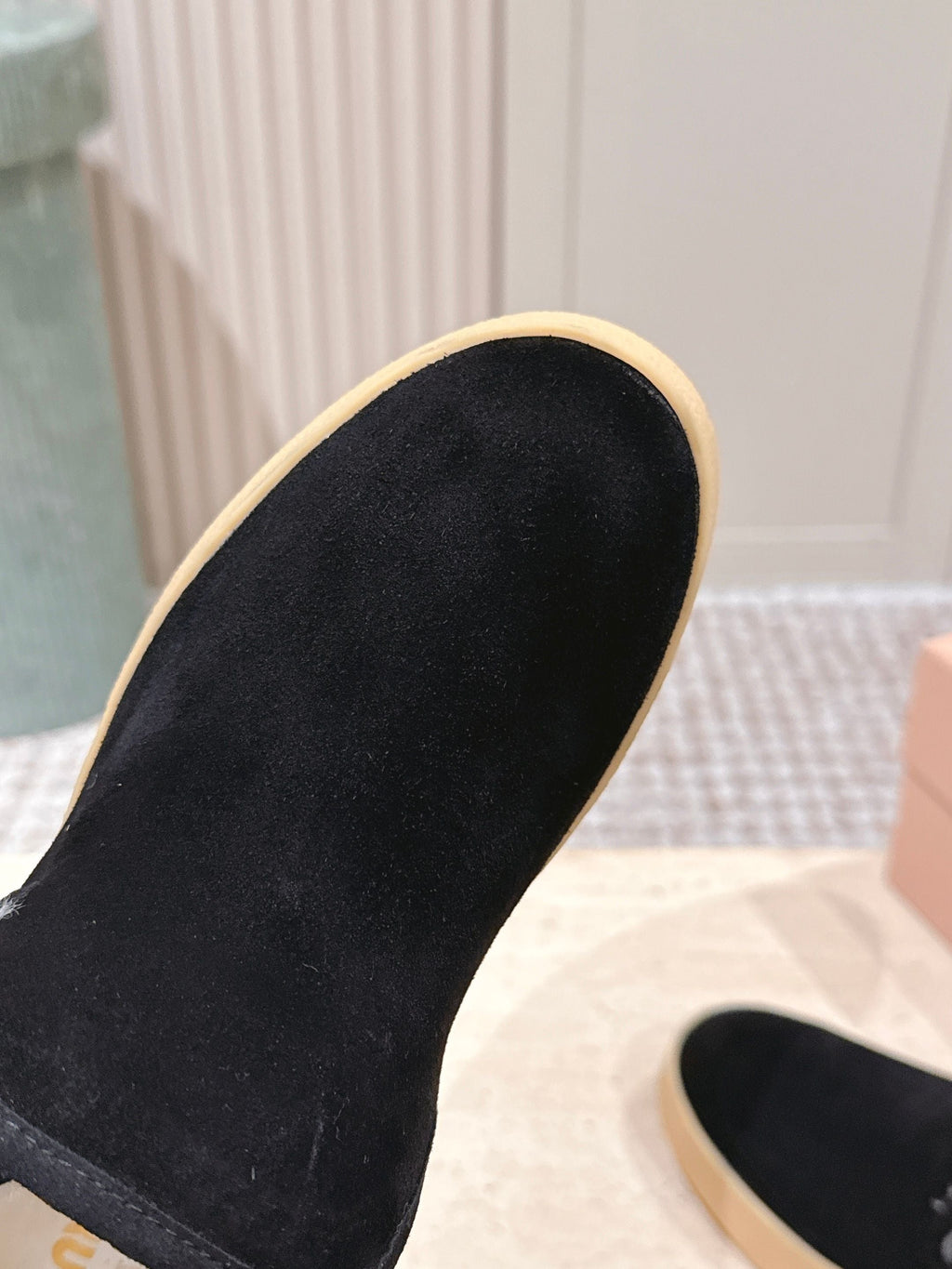 MIUMIU 25S SLIP-ON BOOTIES IN BLACK SUEDE WITH FAUX SHEARLING