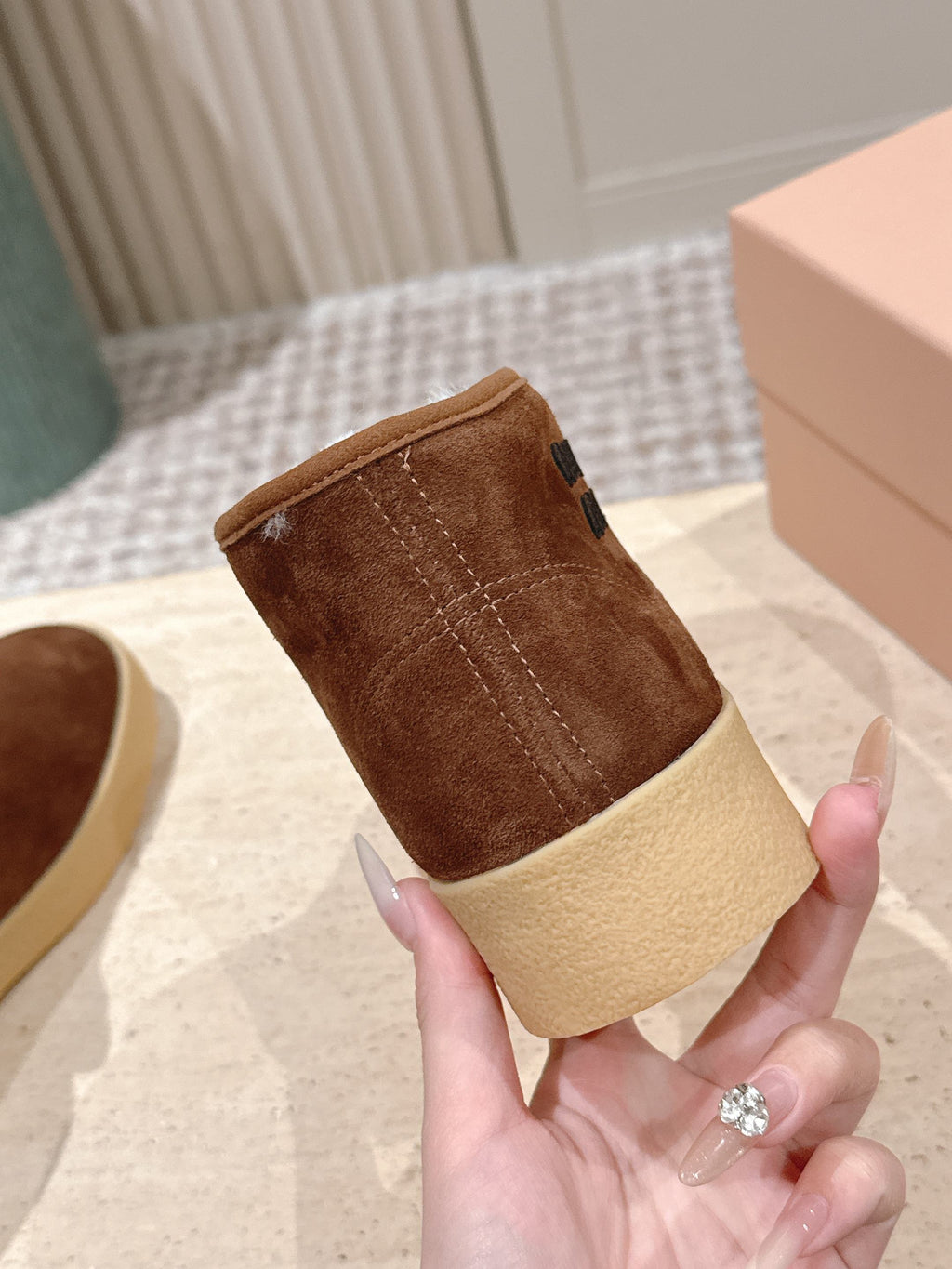 MIUMIU 25S SLIP-ON BOOTIES IN DARK BROWN SUEDE WITH FAUX SHEARLING