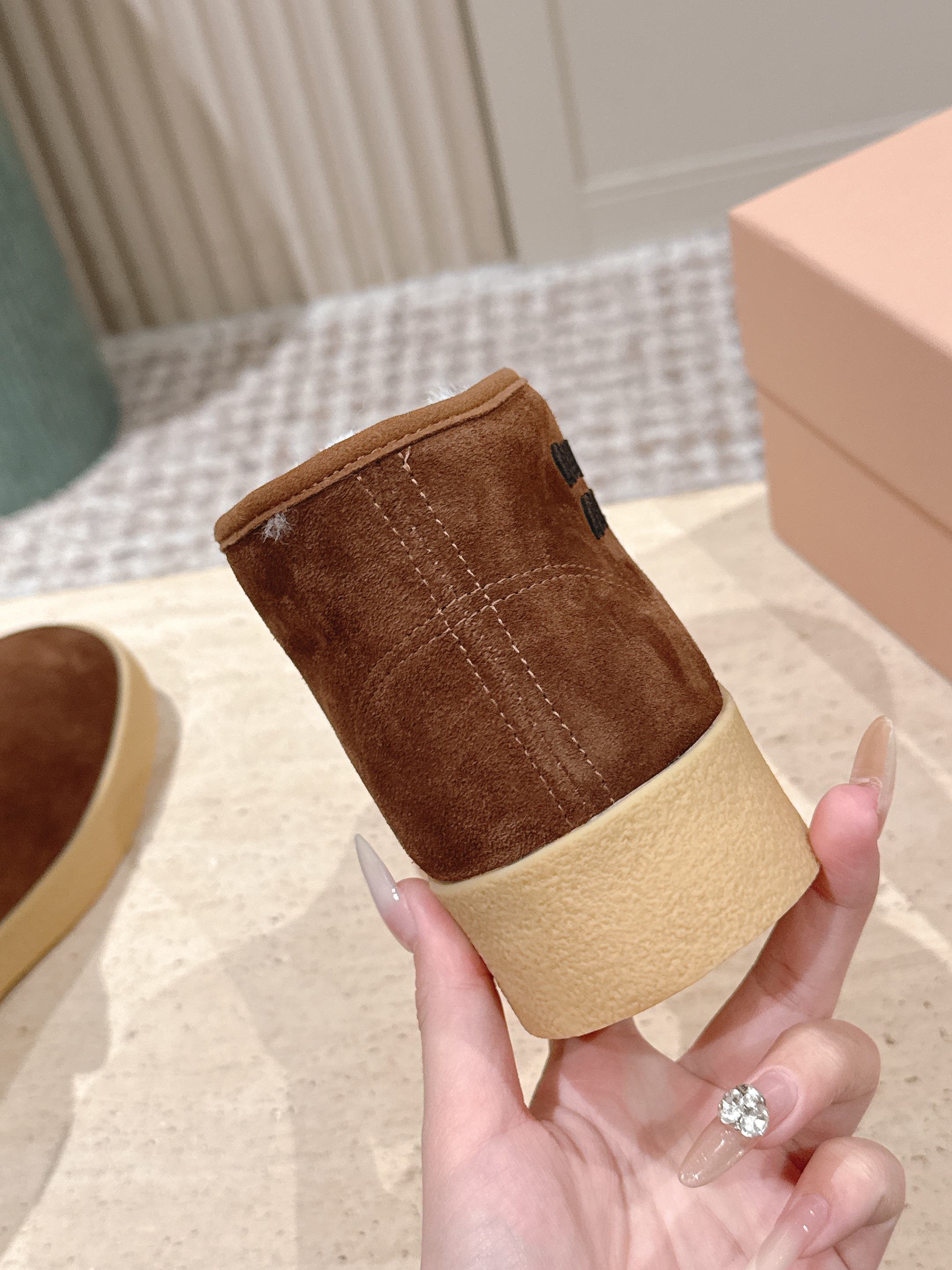 MIUMIU 25S SLIP-ON BOOTIES IN DARK BROWN SUEDE WITH FAUX SHEARLING
