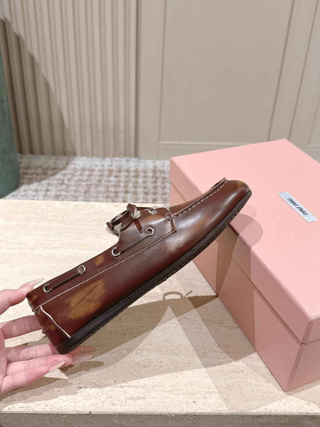 MIUMIU 25S BOAT SHOES IN SIENNA BROWN BLEACHED CALFSKIN WITH SHEARLING