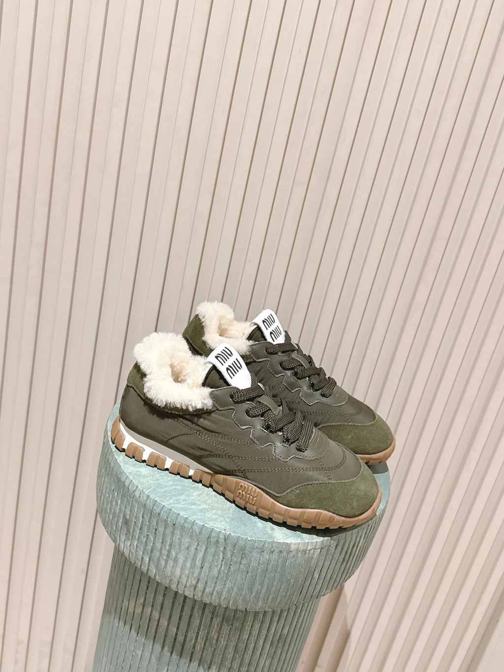 MIUMIU 25S SNEAKERS IN LODEN GREEN TYRE TECHNICAL FABRIC AND SUEDE SHEARLING