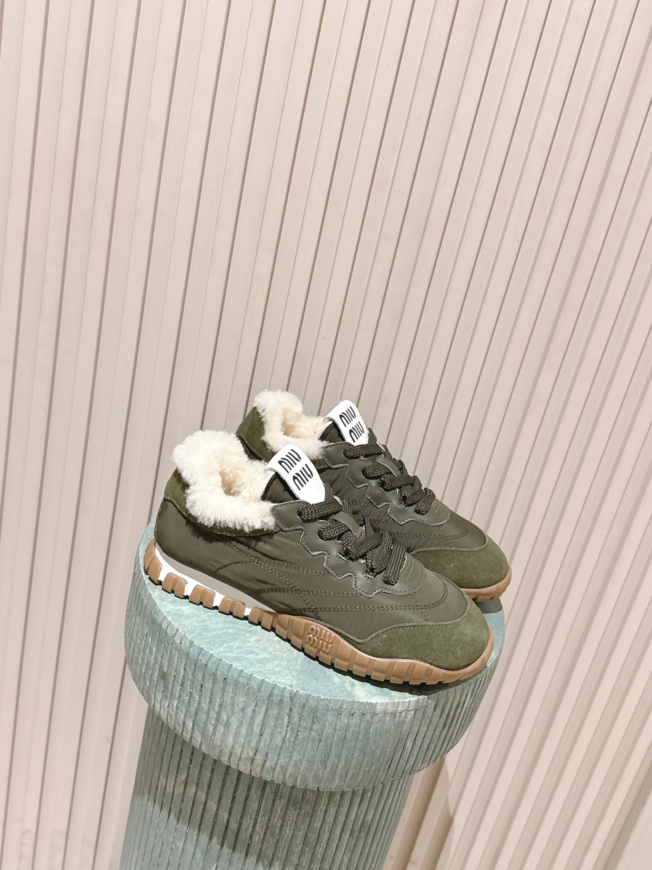 MIUMIU 25S SNEAKERS IN LODEN GREEN TYRE TECHNICAL FABRIC AND SUEDE SHEARLING