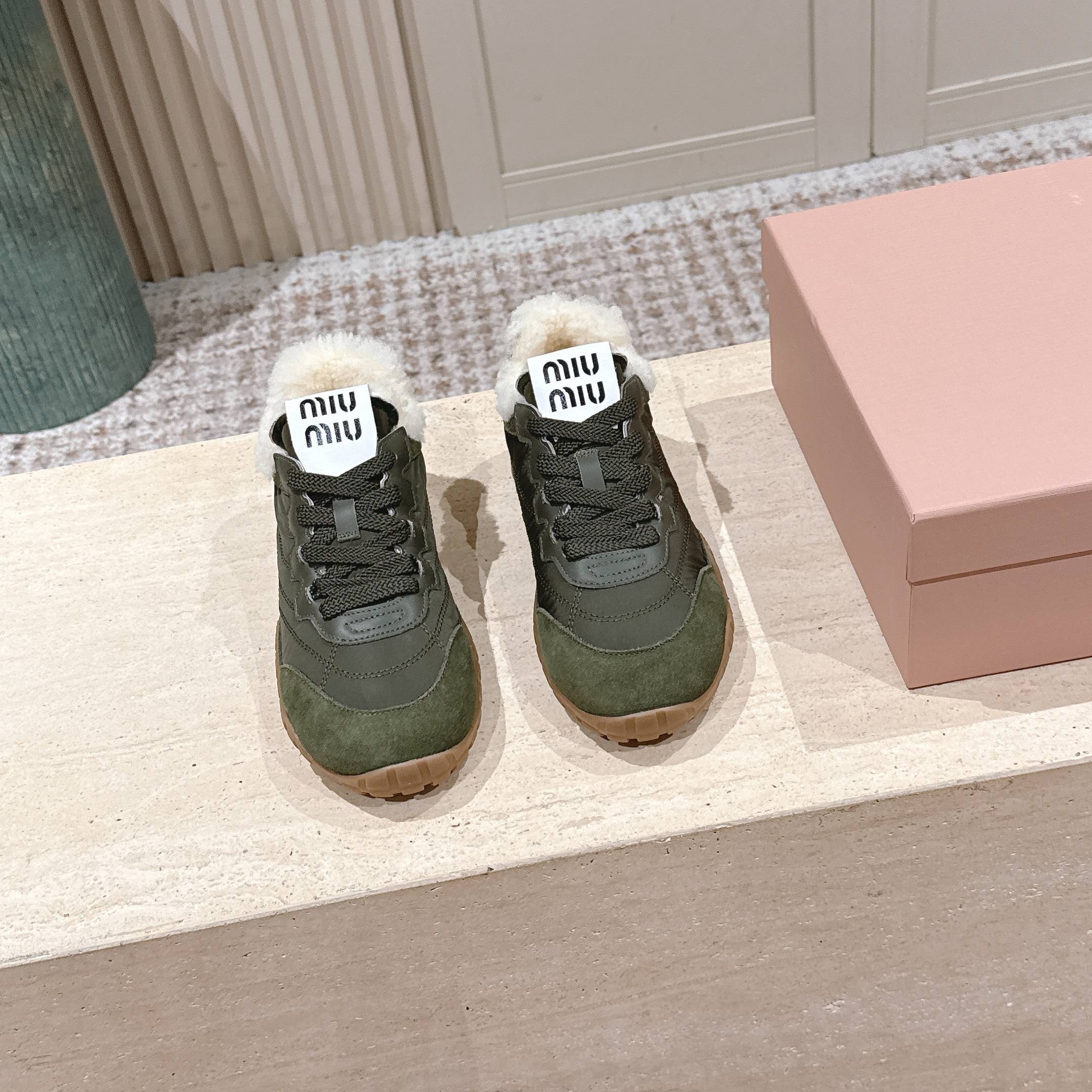 MIUMIU 25S SNEAKERS IN LODEN GREEN TYRE TECHNICAL FABRIC AND SUEDE SHEARLING