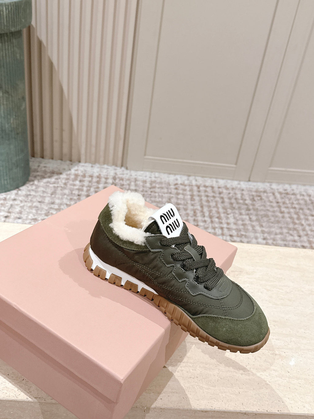 MIUMIU 25S SNEAKERS IN LODEN GREEN TYRE TECHNICAL FABRIC AND SUEDE SHEARLING