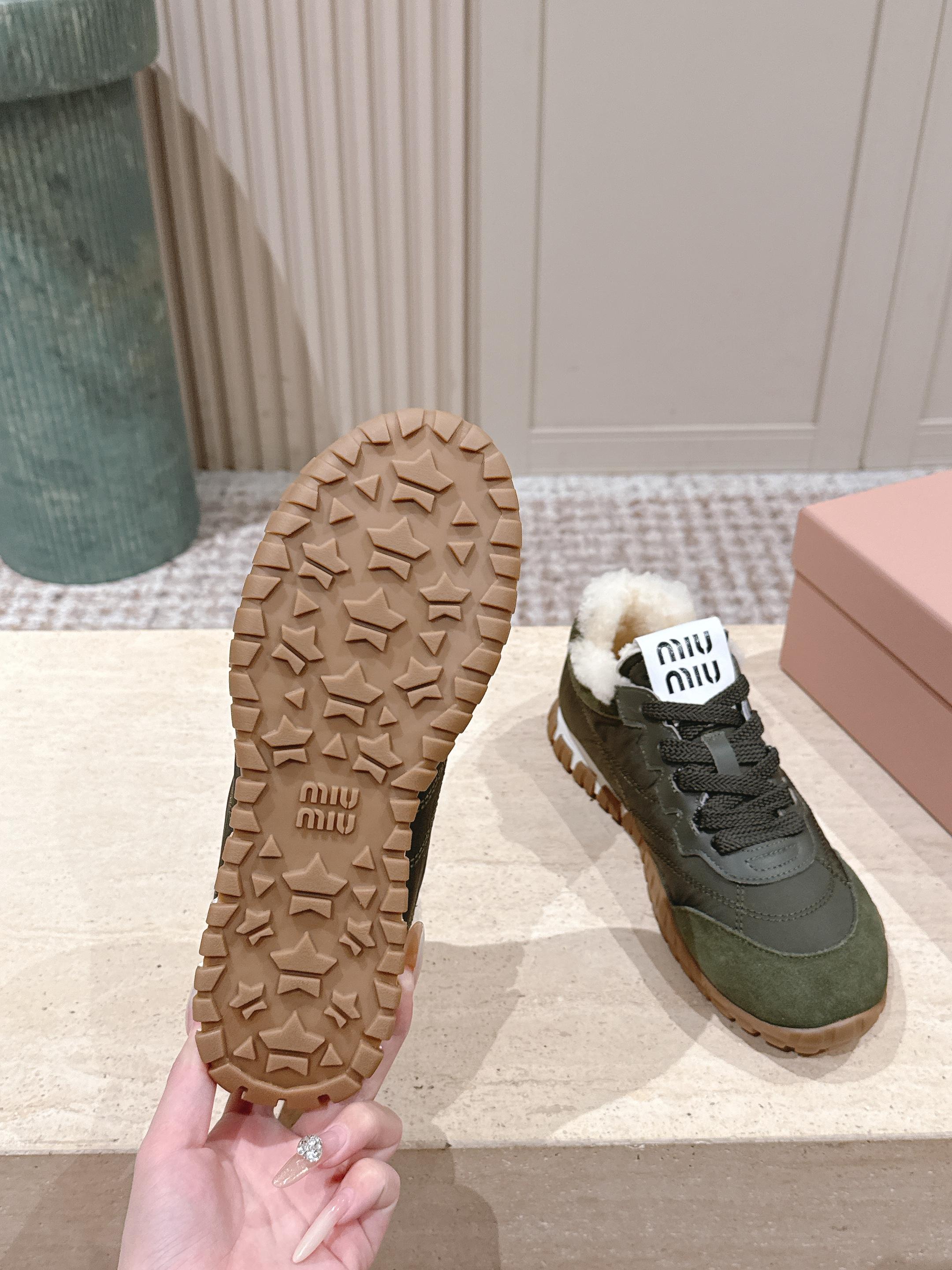 MIUMIU 25S SNEAKERS IN LODEN GREEN TYRE TECHNICAL FABRIC AND SUEDE SHEARLING