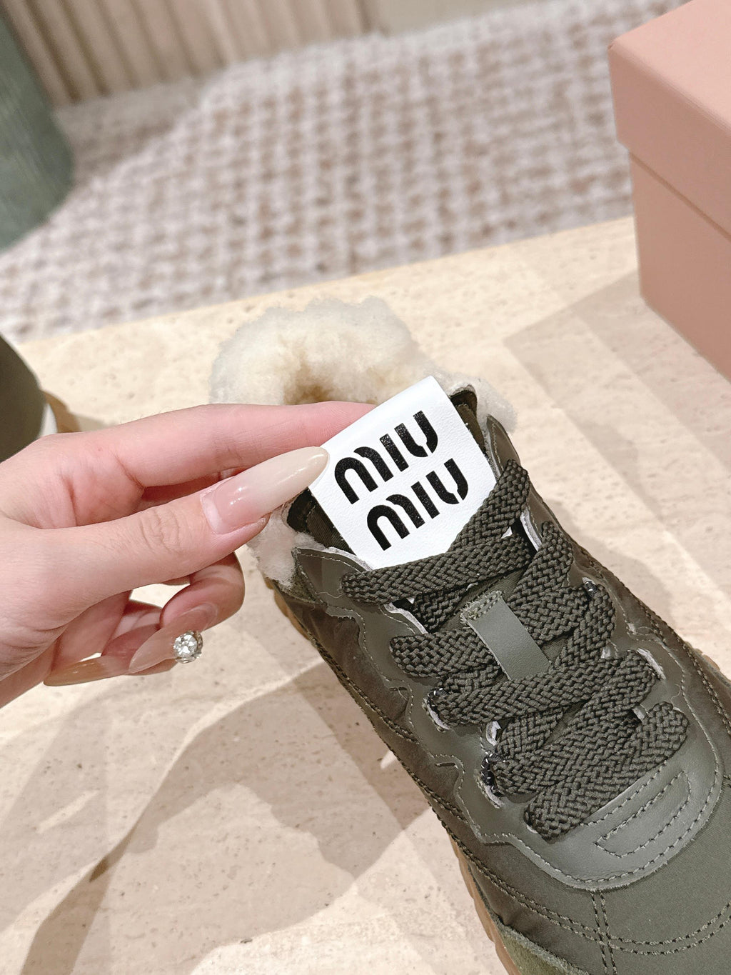 MIUMIU 25S SNEAKERS IN LODEN GREEN TYRE TECHNICAL FABRIC AND SUEDE SHEARLING
