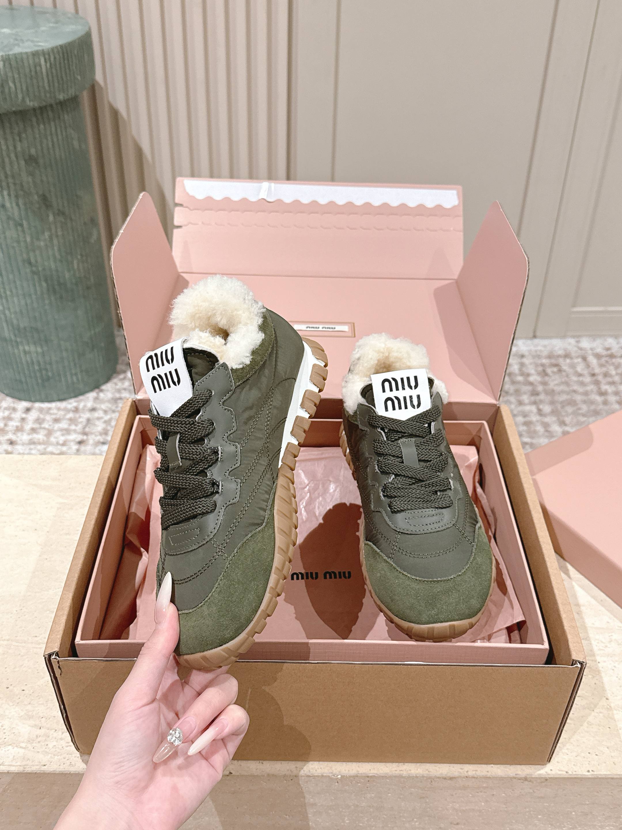 MIUMIU 25S SNEAKERS IN LODEN GREEN TYRE TECHNICAL FABRIC AND SUEDE SHEARLING