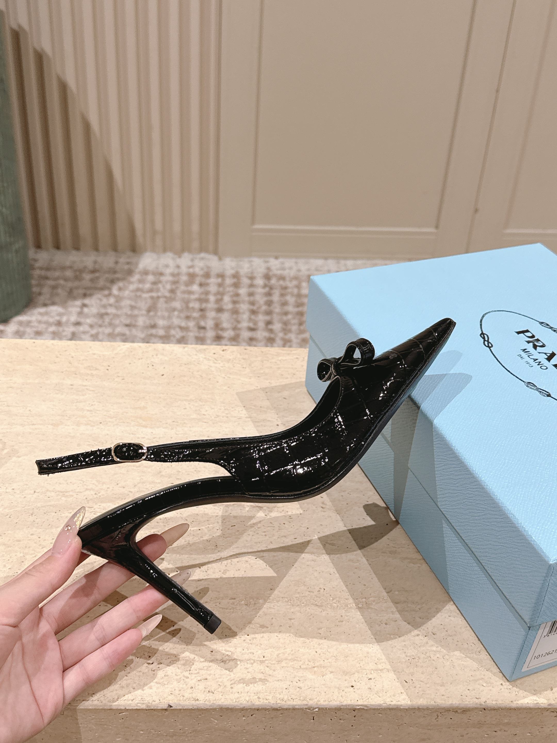 PRADA 26S POINTED-TOE SLINGBACK HEELS 85MM IN BLACK CROC-EMBOSSED CALFSKIN