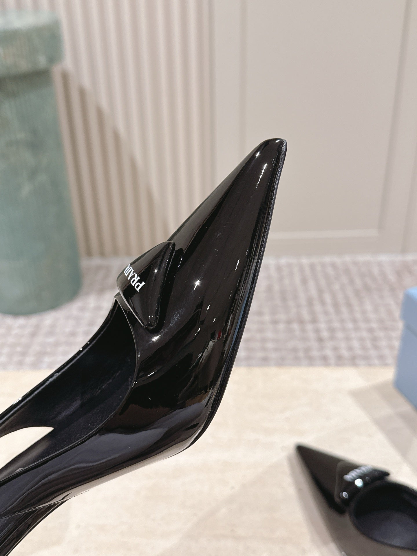 PRADA 26S POINTED-TOE SLINGBACK HEELS 75MM IN BLACK PATENT CALFSKIN