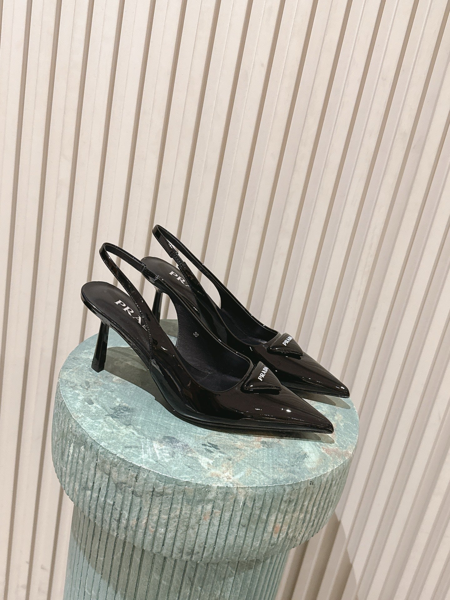 PRADA 26S POINTED-TOE SLINGBACK HEELS 75MM IN BLACK PATENT CALFSKIN