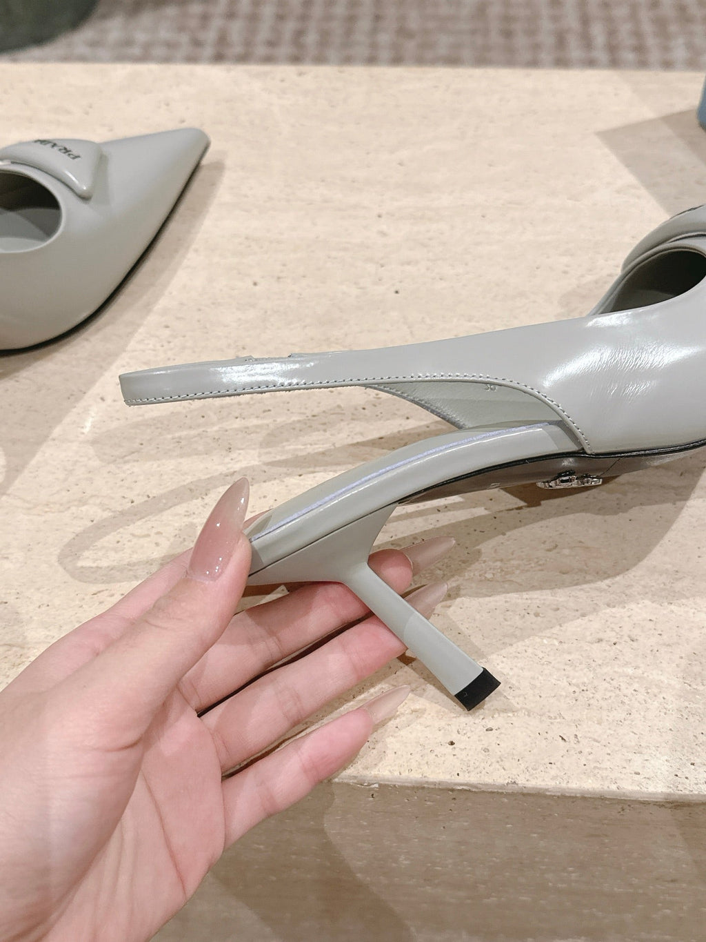 PRADA 26S POINTED-TOE SLINGBACK HEELS 75MM IN SOFT GRAY SHINY CALFSKIN