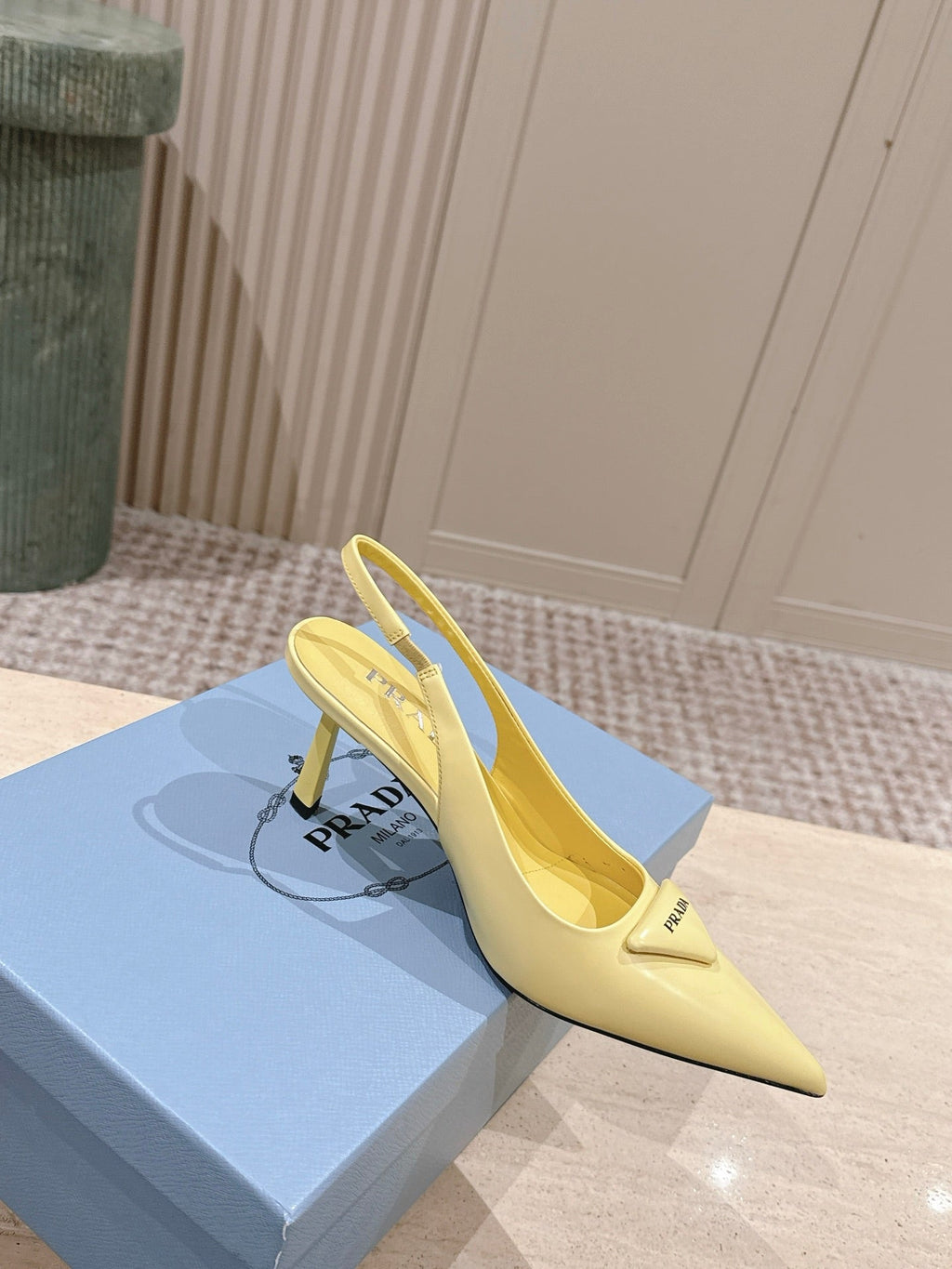PRADA 26S POINTED-TOE SLINGBACK HEELS 75MM IN PASTEL YELLOW SHINY CALFSKIN