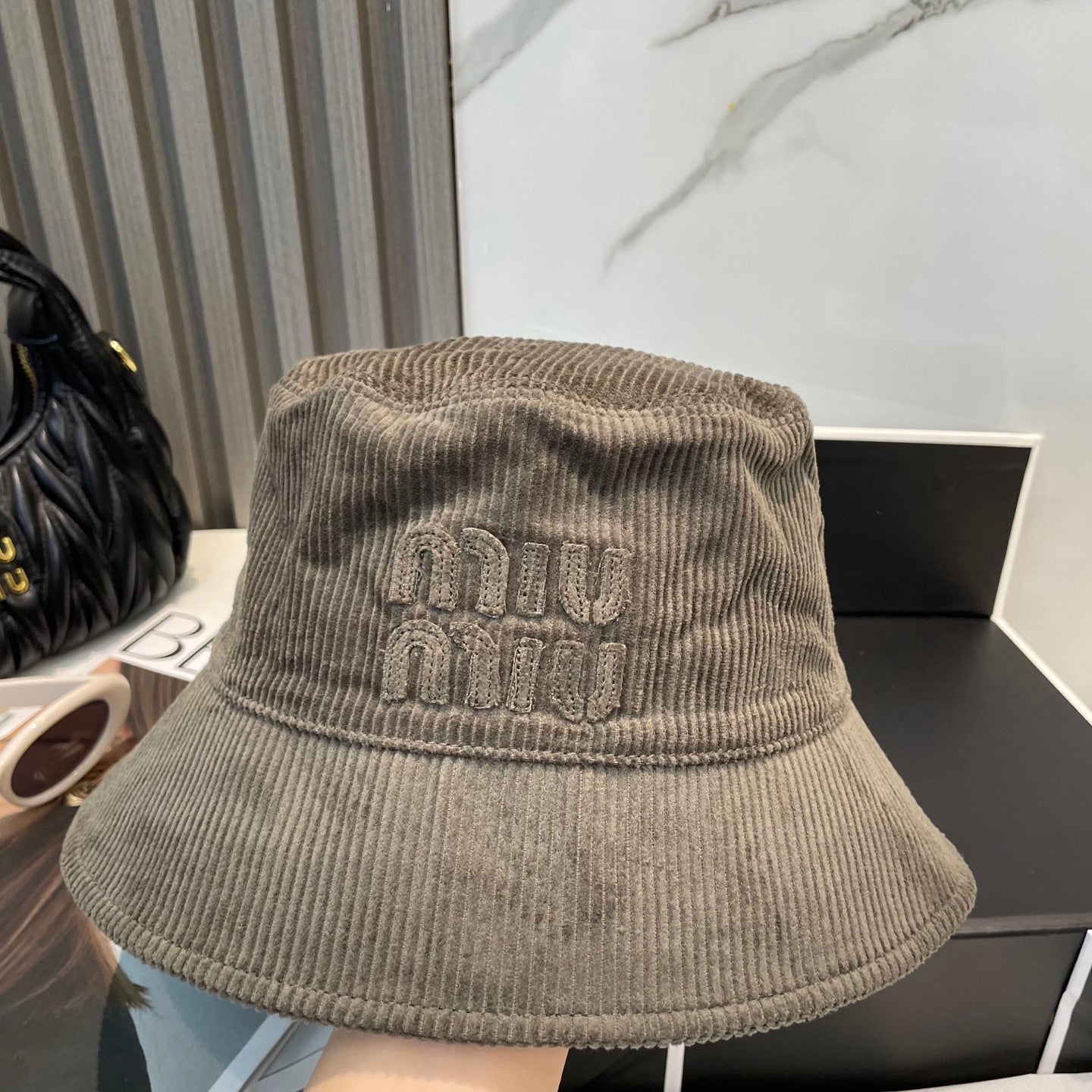 MIUMIU BUCKET IN MUTED BROWN VELVET WITH LOGO